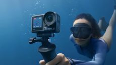 DJI Osmo Action 4 underwater in the hands of a diver